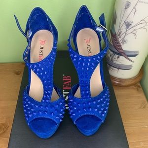 Blue spiky platform heels